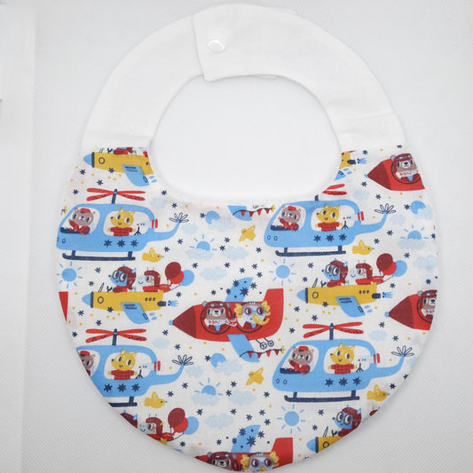 Baby bib with cartoon helicopter and airplane design on a white background