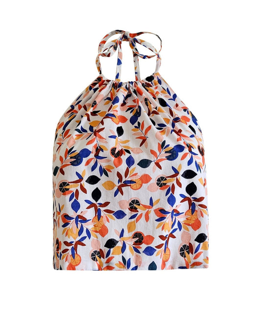 A floral print cotton top with a round neckline, short sleeves, and a tie at the waist, displayed against a white background.