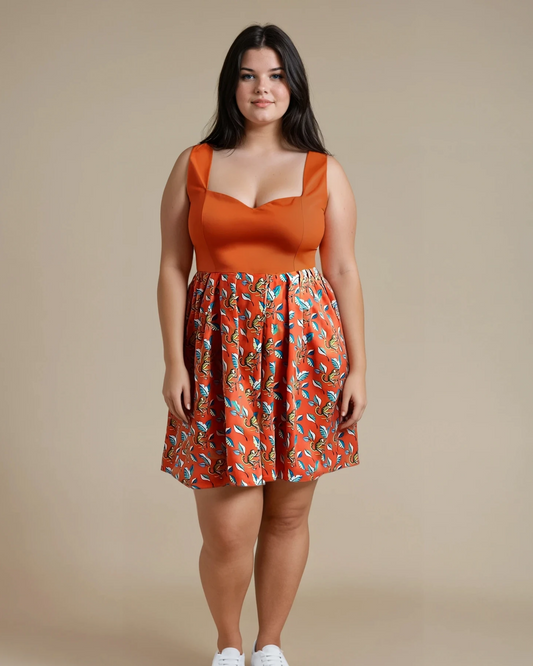 Woman wearing an orange sweatheart dress,